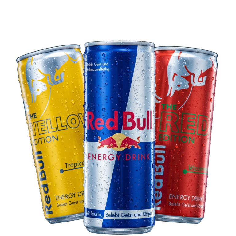 Drei eiskalte Dosen Red Bull (Yellow Edition, Classic, Red Edition) aus dem 24/7 Getränkeautomaten in Schüttdorf, Zell am See